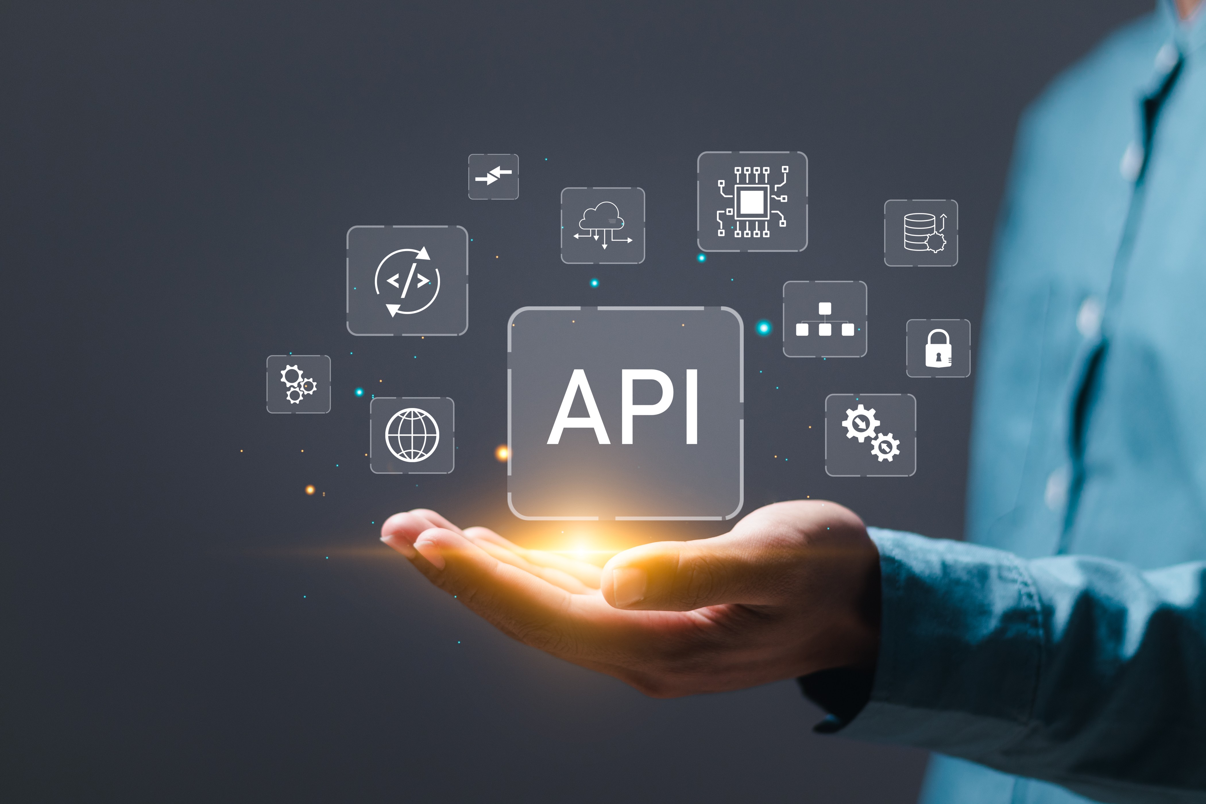 api-application-programming-interface-concept-man-holding-virtual-screen-api-icon-software-development-tool (1).jpg